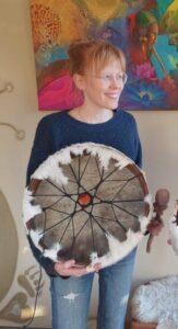 Who is Art Sound & Medicine Woman? Frouke Vermeulen holding her shaman drum.